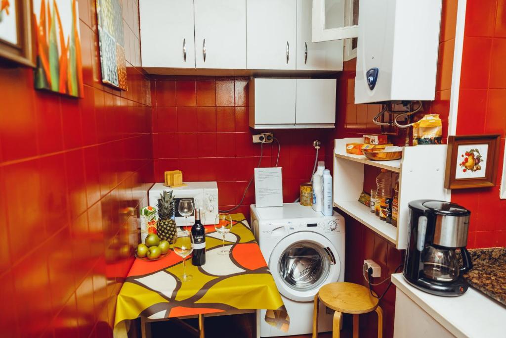 Kuchyňa alebo kuchynka v ubytovaní Grand Central Apartment
