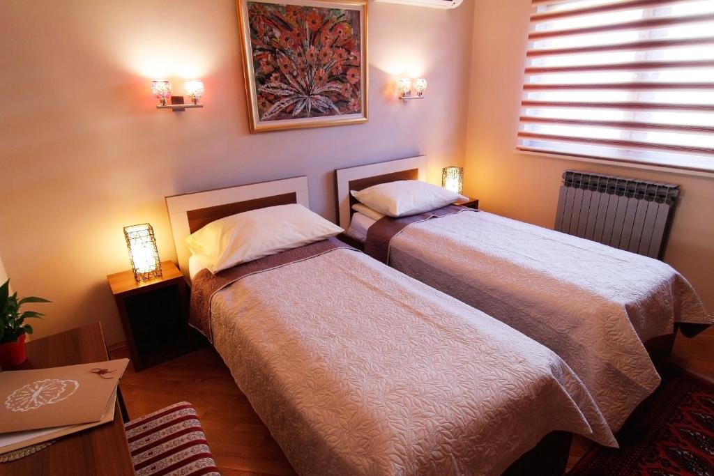 Postel nebo postele na pokoji v ubytování Le Petit Prince Guesthouse Free Parking