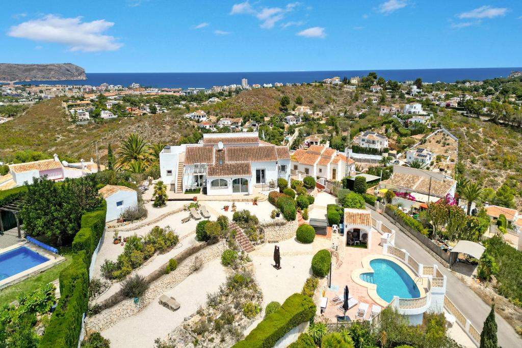 an aerial view of a villa with a swimming pool at Ayora in Jávea