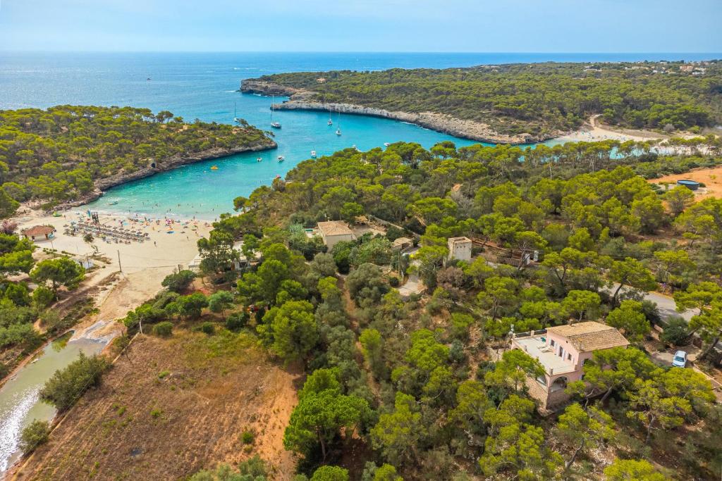an aerial view of a beach and the ocean at Villa Rosa in Cala Santanyi