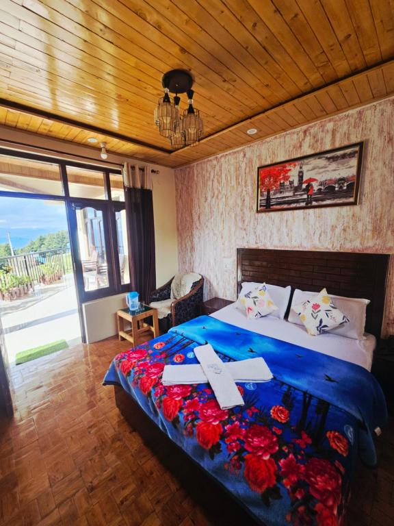 a bedroom with a bed with a cross on it at Smarthill Deodar Echoes in Dalhousie