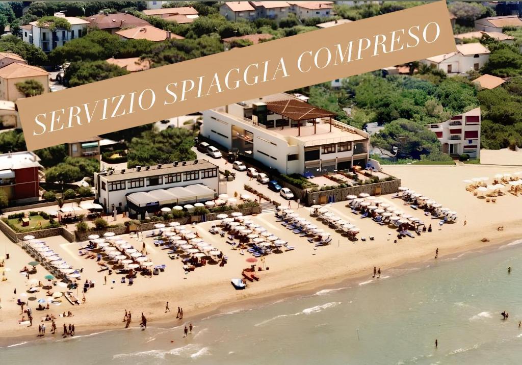 an aerial view of a beach with a resort at La Lanterna in San Vincenzo