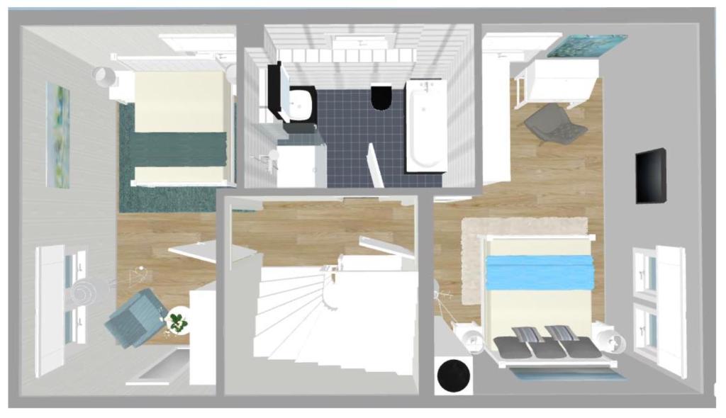 a floor plan of a house with a room at Haus Ausspanne in Zingst