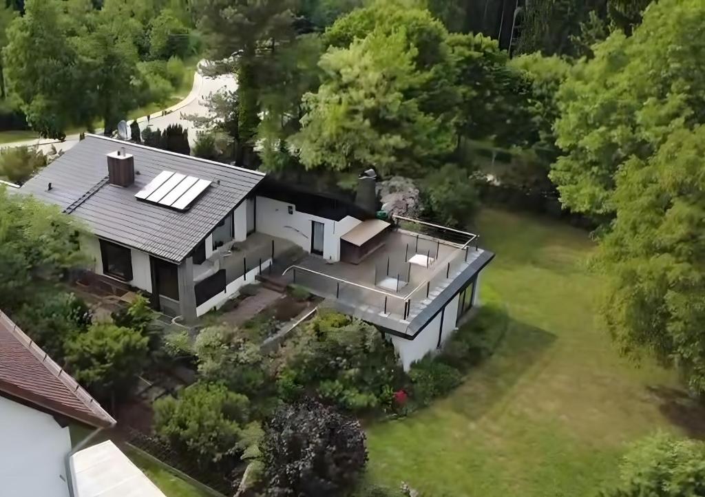 an aerial view of a house at Ferienhaus mit Schwimmhalle in Burgthann