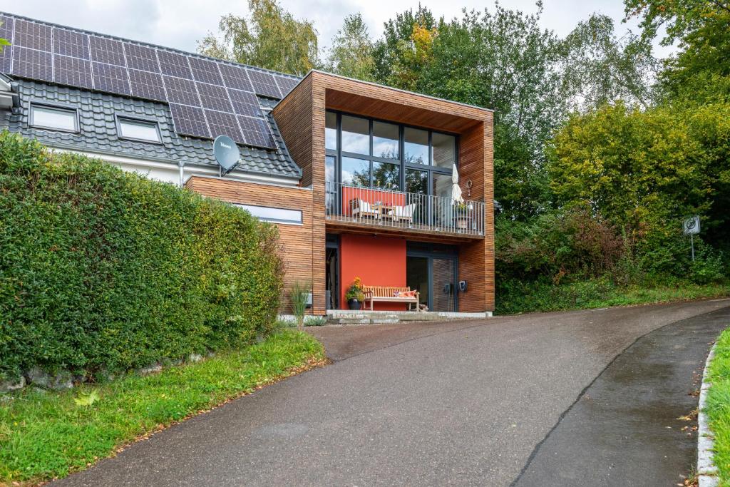 a house with solar panels on the roof at Gästehaus Wüpping 3 in Salem