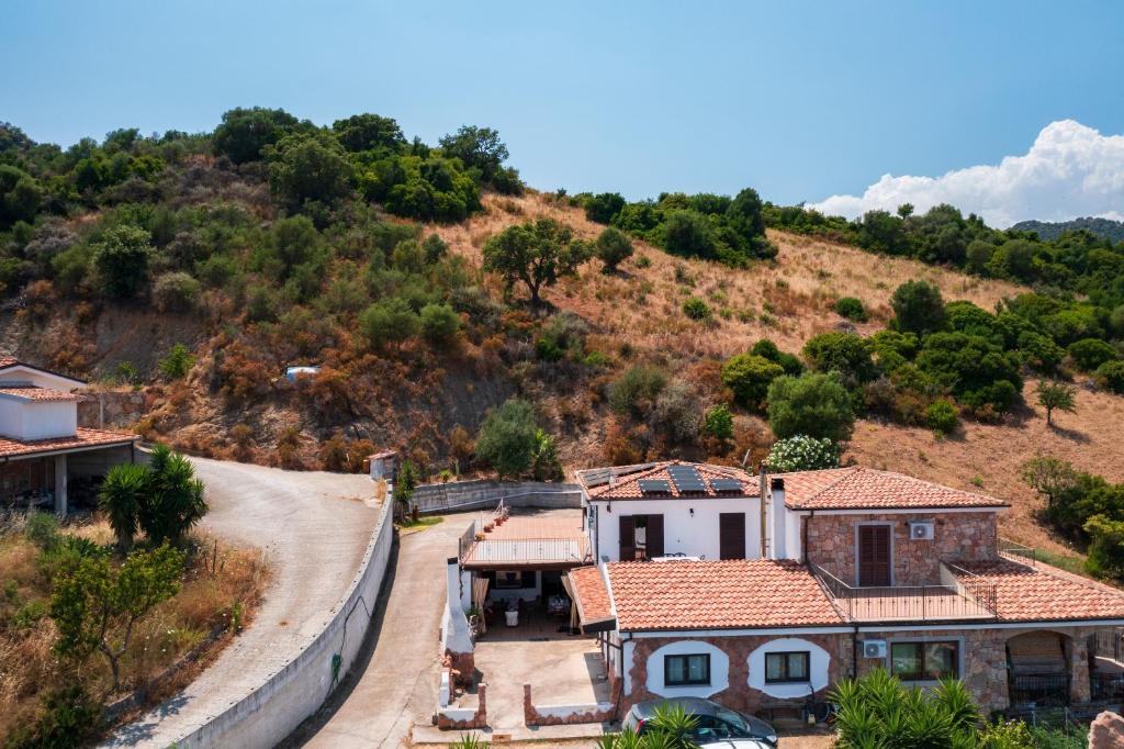 an aerial view of a house on a hill at Vistamare2 in Cardedu
