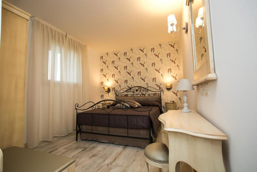 Postel nebo postele na pokoji v ubytování Guest House Dolce Laguna
