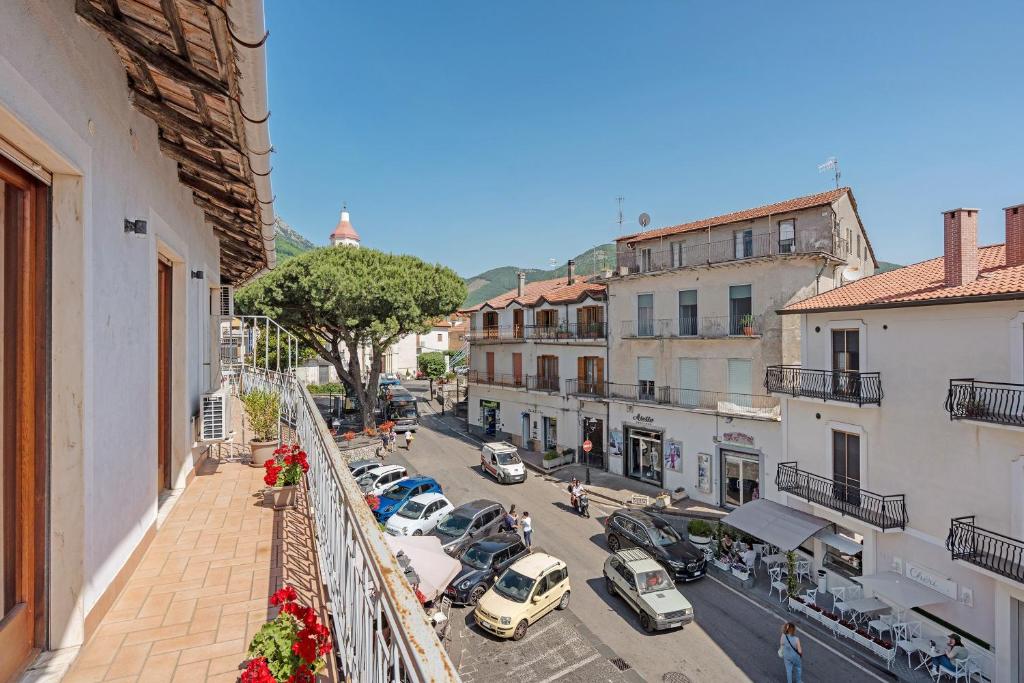 a view of a city street with cars parked at Appartamento il Sentiero degli Dei in Agerola