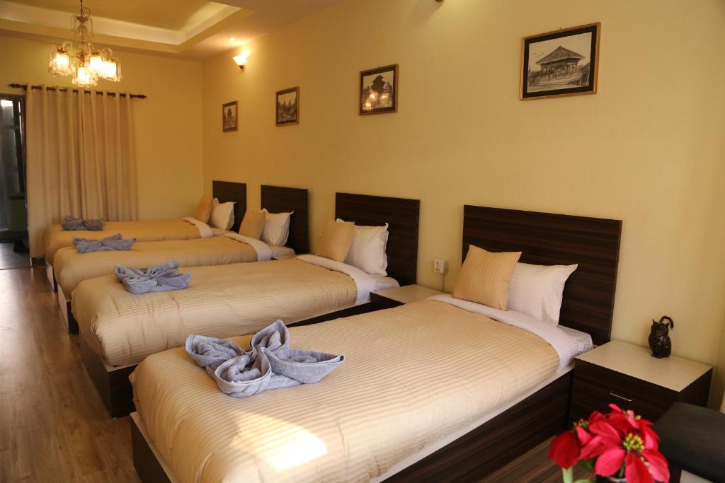 Postel nebo postele na pokoji v ubytování Bed and Breakfast Thamel