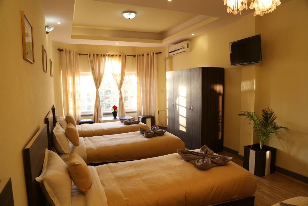 TV a/nebo společenská místnost v ubytování Bed and Breakfast Thamel