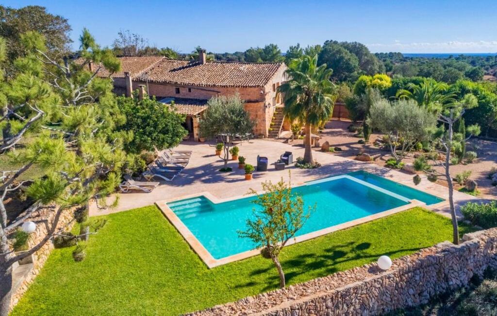 an aerial view of a villa with a swimming pool at Son Gabriela in Llucmajor