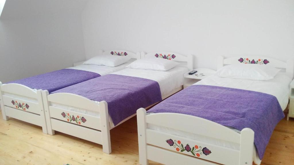 Postel nebo postele na pokoji v ubytování Pensiunea Marceluca