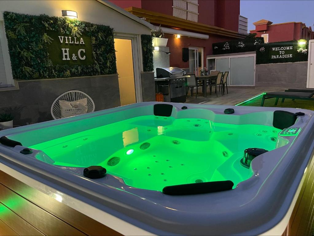 a pool table in the middle of a room with a pool table at Villa Hyc Playa de las burras in Maspalomas