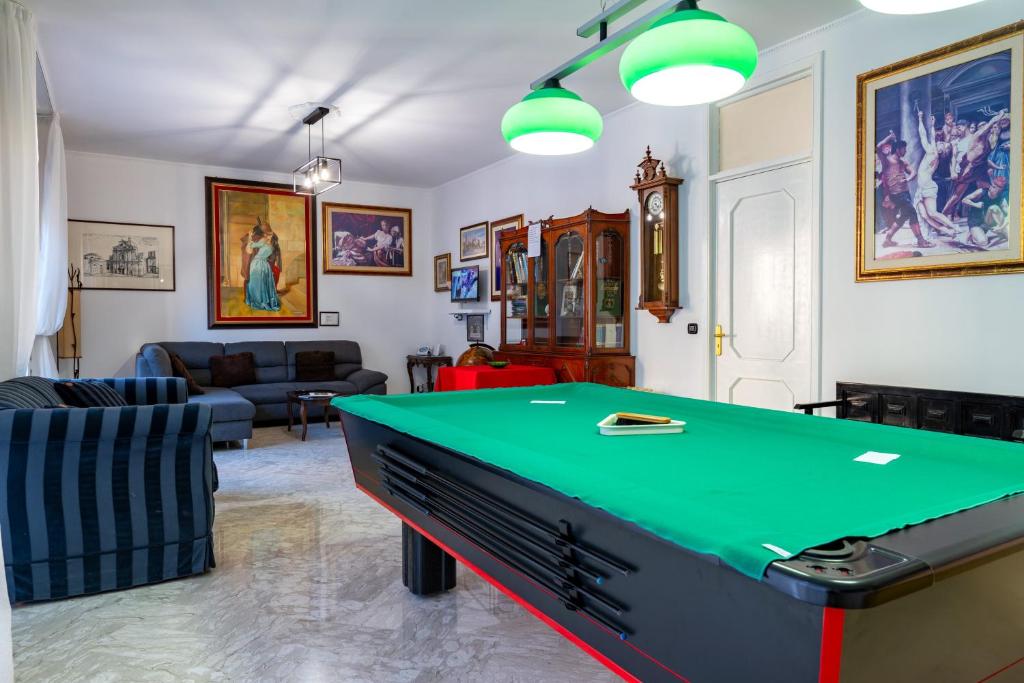 a living room with a pool table at Casa Ester in Francavilla Fontana