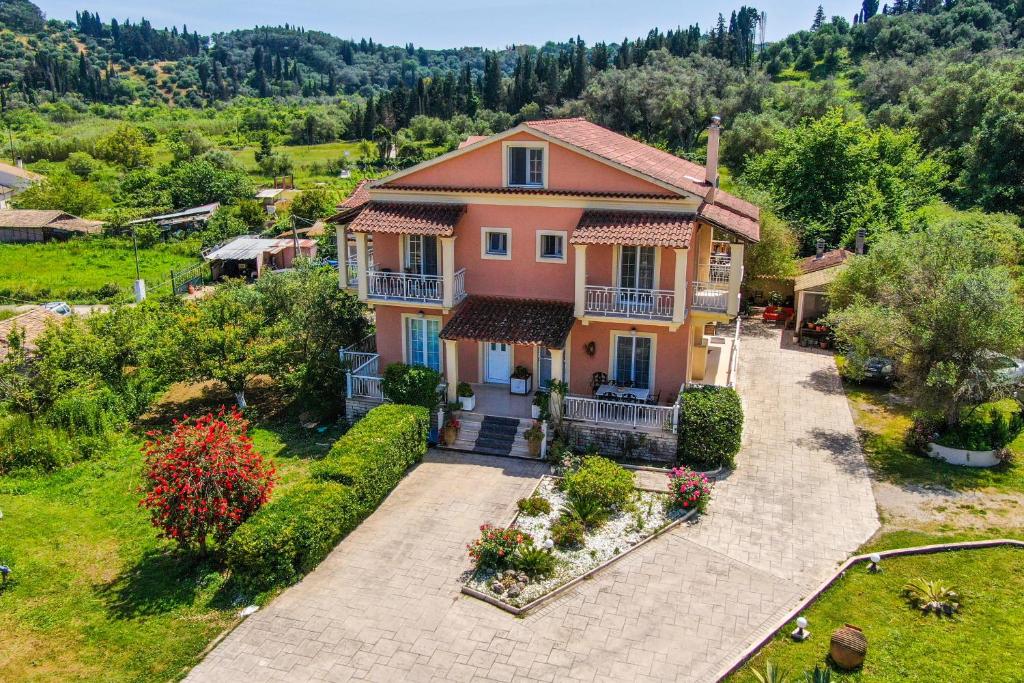 an aerial view of a house with a garden at Villa Logas in Peroulades