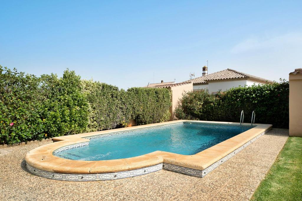 a swimming pool in the backyard of a house at Villa Perez Zara 1 in Campano