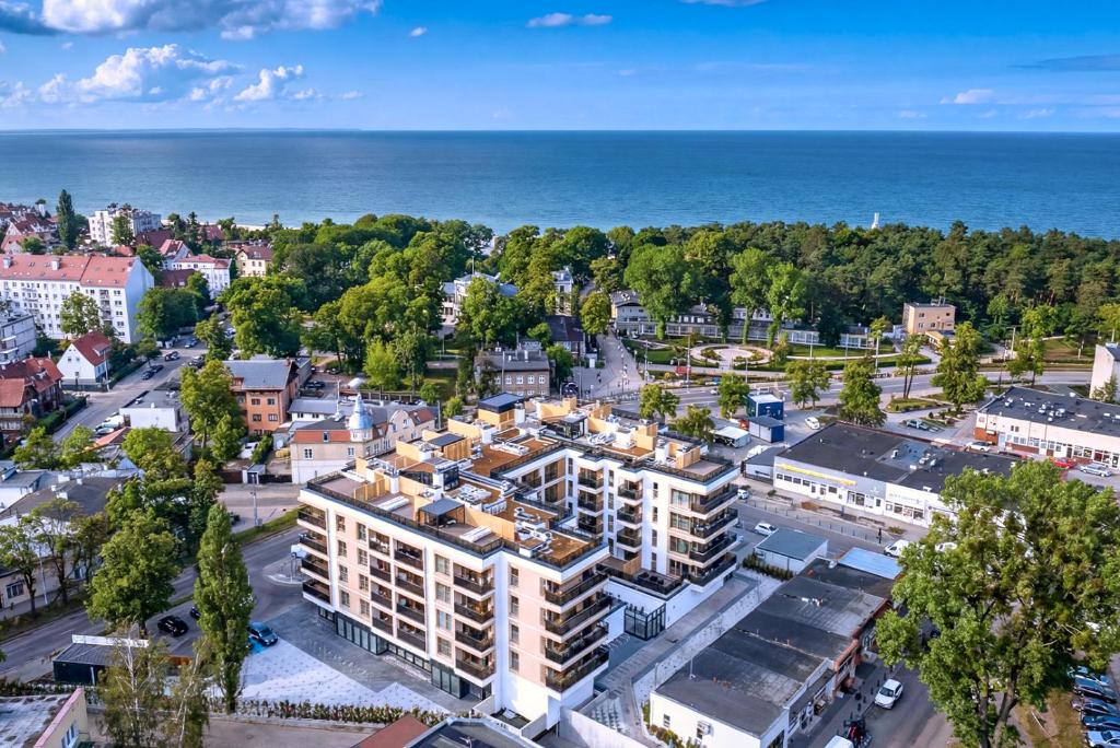 an aerial view of a city with the ocean at Amber Seaside Apartment - Luxury Apartment with Balcony and Parking in Gdansk in Gdańsk