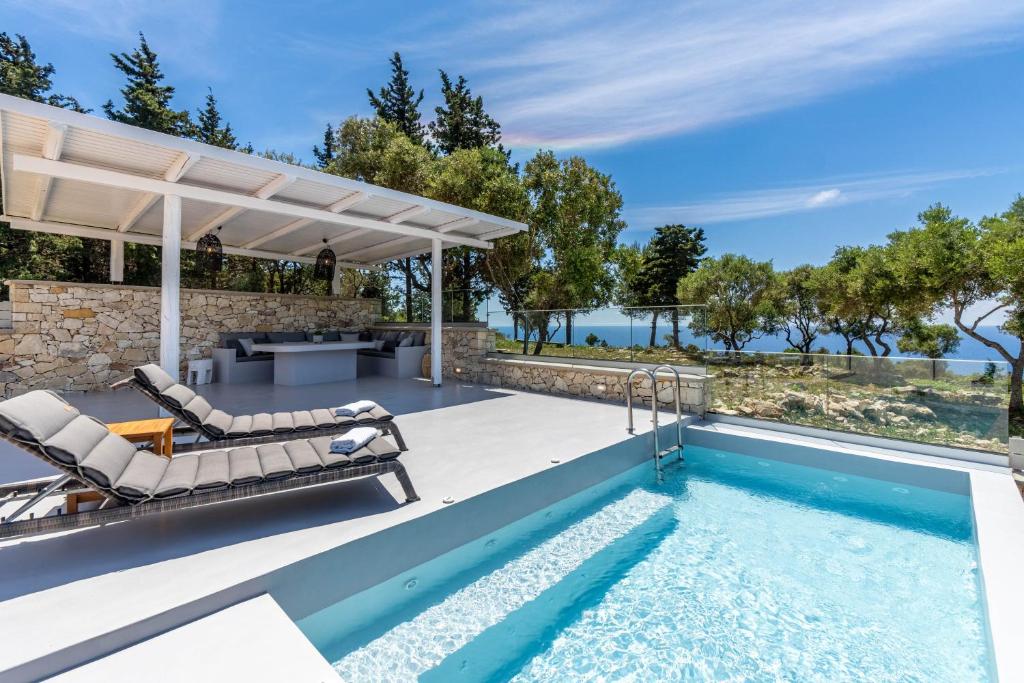 Pool and terrace at Antipaxos Sunset House