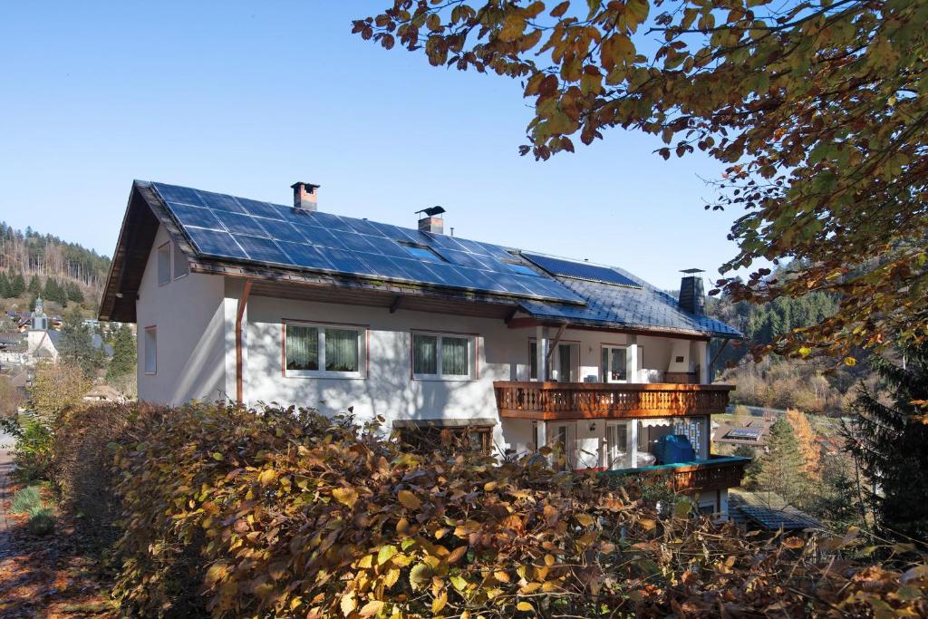 a house with solar panels on the roof at Haus Monika in Todtmoos