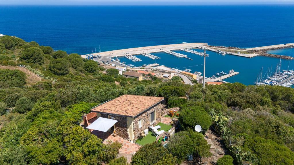 an aerial view of a house with a marina at Hakéyah in Castelsardo