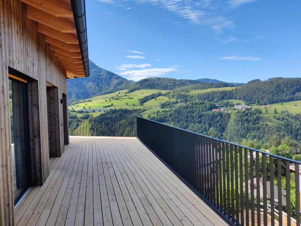 a balcony with a view of the mountains at Aumia Apartment Turmalin in Völs am Schlern