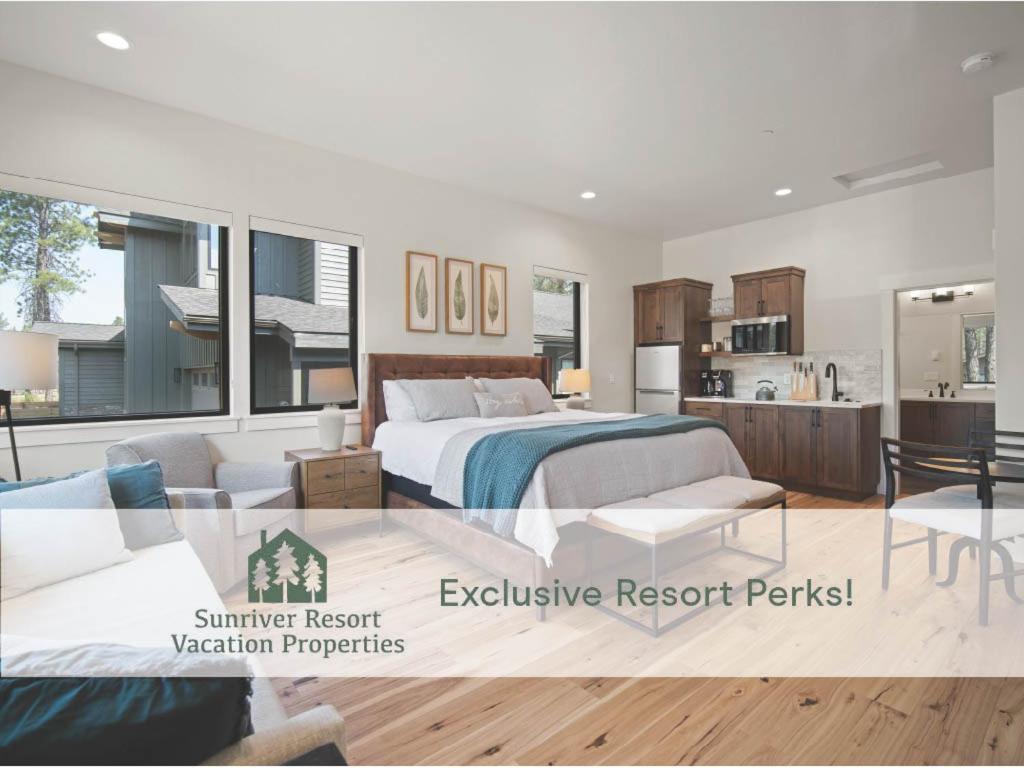 a bedroom with a bed and a living room at 18124-2 Forestbrook Loop in Bend