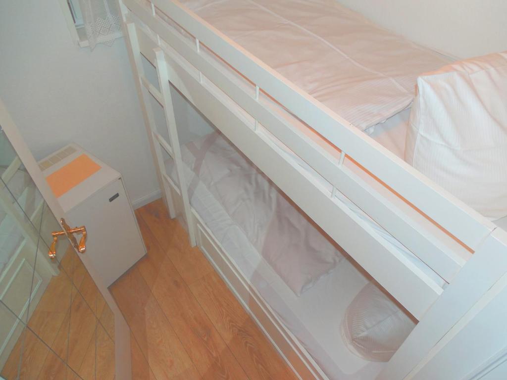 Postel nebo postele na pokoji v ubytování Hotel Christiansen