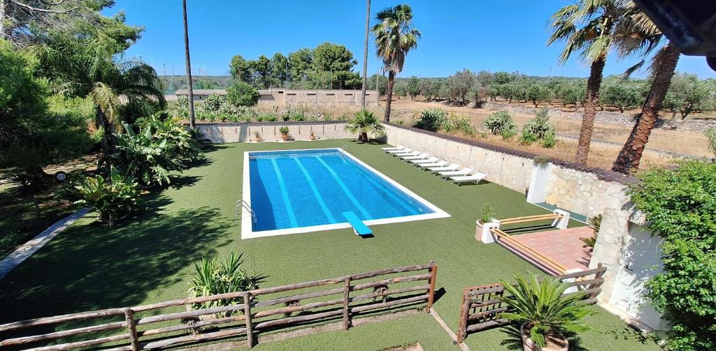 an overhead view of a swimming pool in a yard at Villa Dany with pool in Villa Castelli