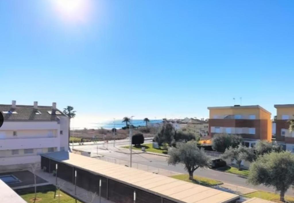 a view of a building with a parking lot at Duplex Mediterranea in Benicarló