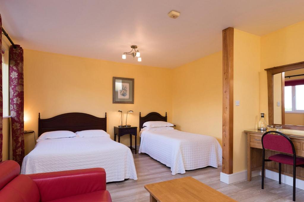 Postel nebo postele na pokoji v ubytování Kilbree House B&B