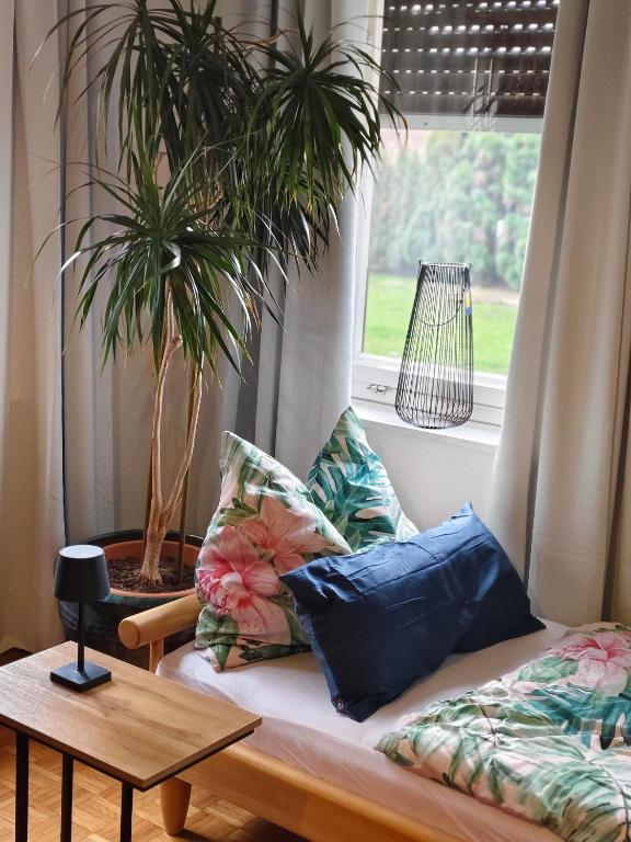 a living room with a couch and a window at Ferienhaus Wurzinger in Mureck
