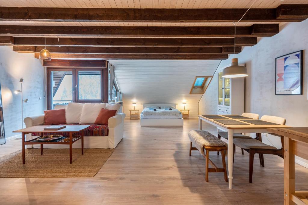 a living room with a couch and a table at Köhlerstube Todtmoos in Todtmoos