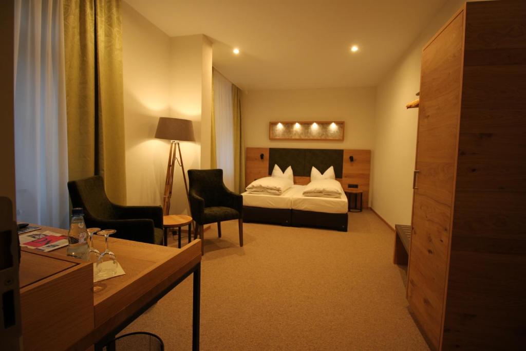 Postel nebo postele na pokoji v ubytování Hotel Hartl's Lindenmühle