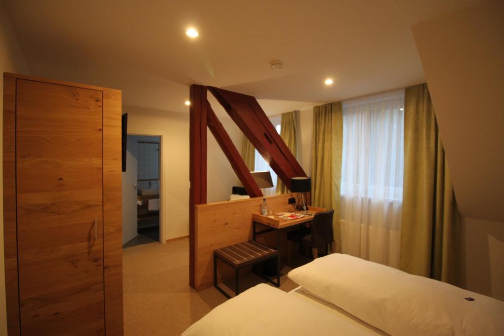 Postel nebo postele na pokoji v ubytování Hotel Hartl's Lindenmühle