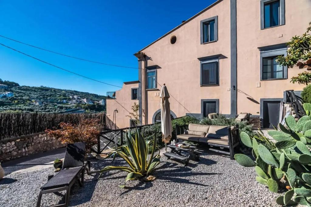 an image of a house with a garden at Villa Cangiani in Massa Lubrense