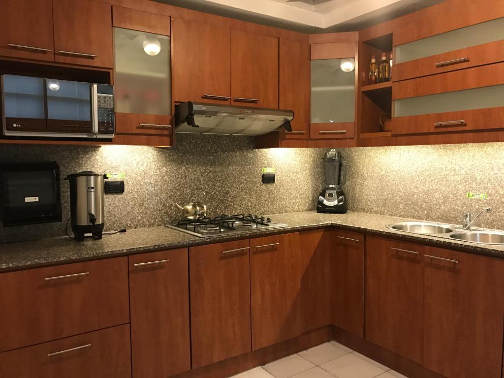 Kuchyň nebo kuchyňský kout v ubytování Kinde House