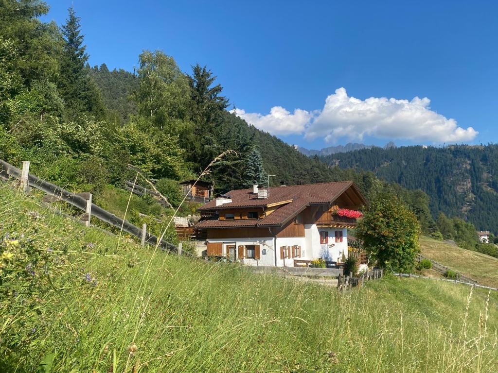a house on the side of a hill at Ferienhaus Leitner in Tires