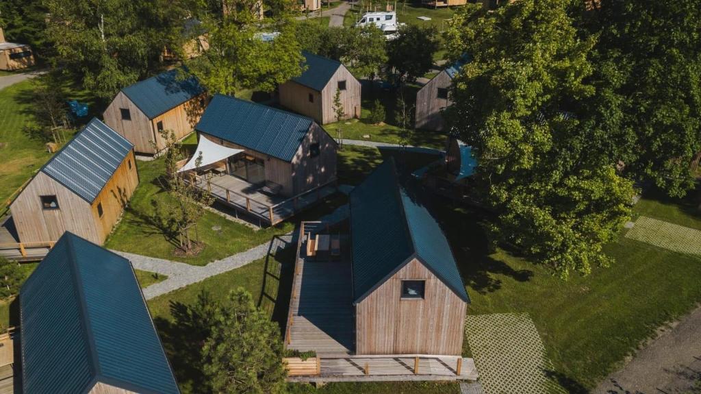 an overhead view of a house with blue roofs at PRIMÁTOR CAMPING RESORT LITOMYŠL in Litomyšl