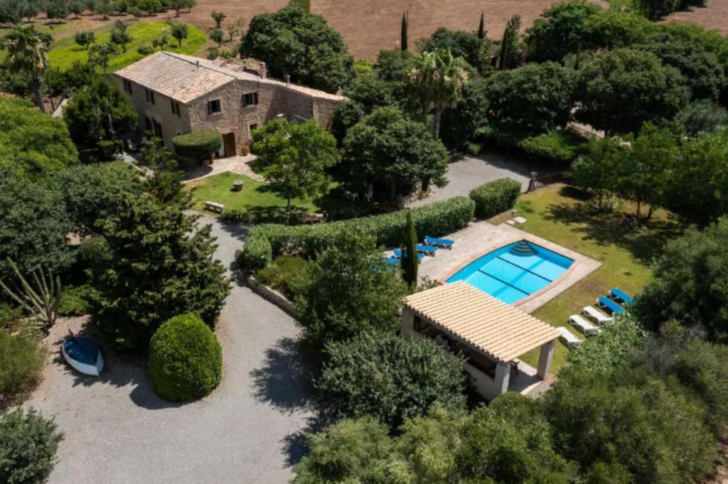an aerial view of a house with a swimming pool at Ca'n Pont in El Port
