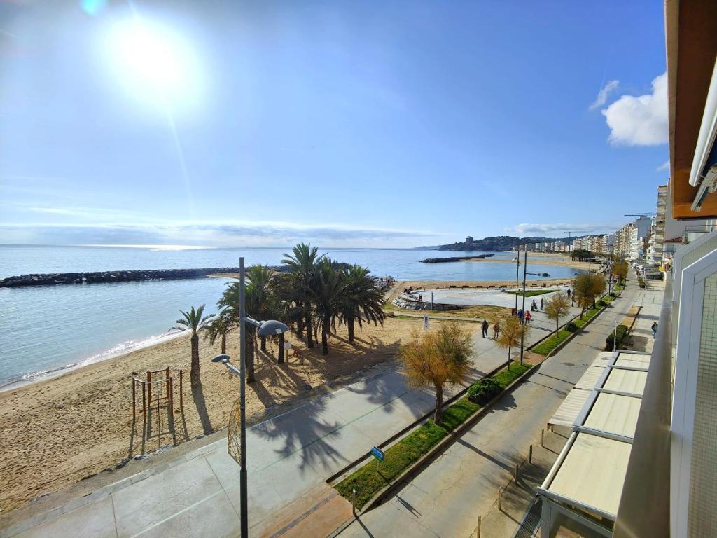 a view of the beach from a balcony at Primera linea Sant Antoni Calonge in Sant Antoni de Calonge