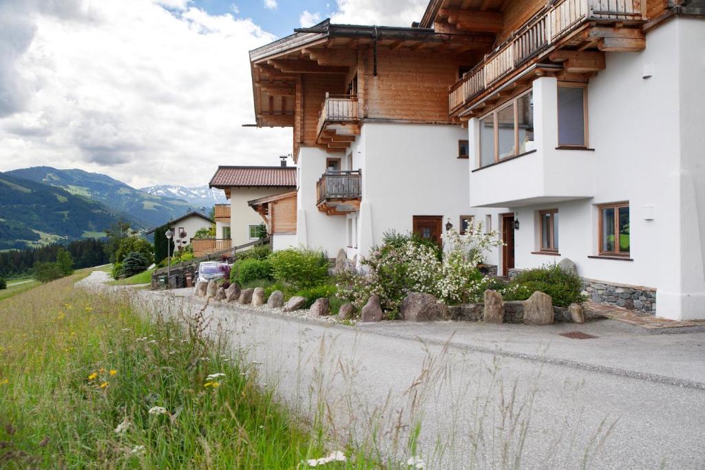 a house on the side of a road at Bergnest Penning in Hopfgarten im Brixental