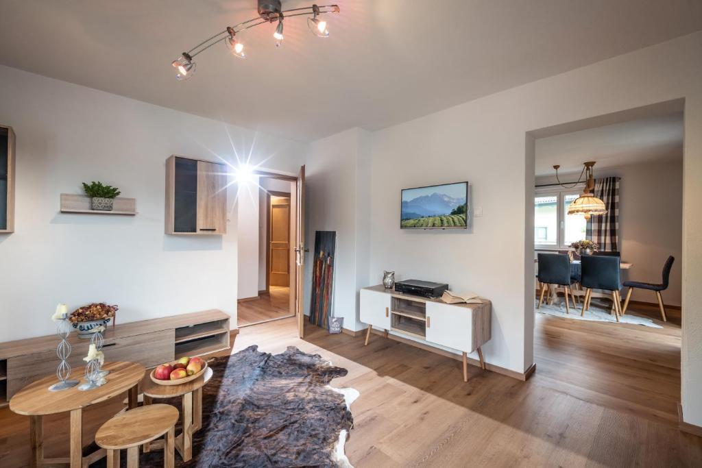 a living room with a couch and a table at Apartment Eve in Söll
