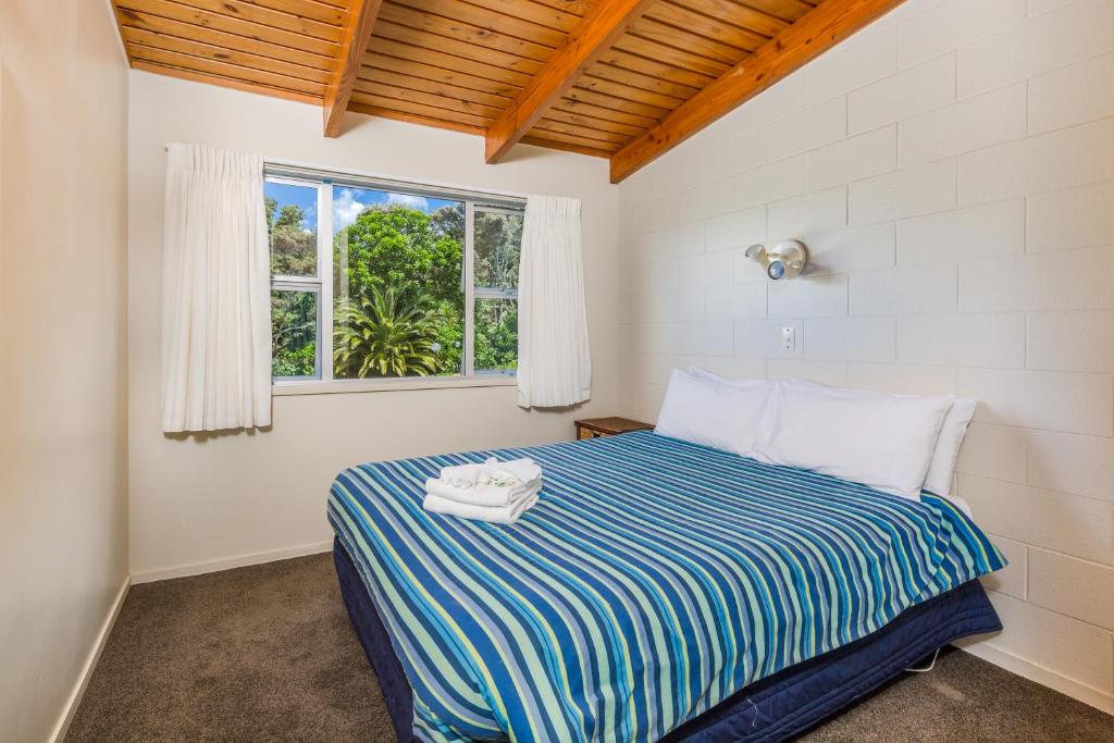 Postel nebo postele na pokoji v ubytování Aloha Seaview Resort Motel