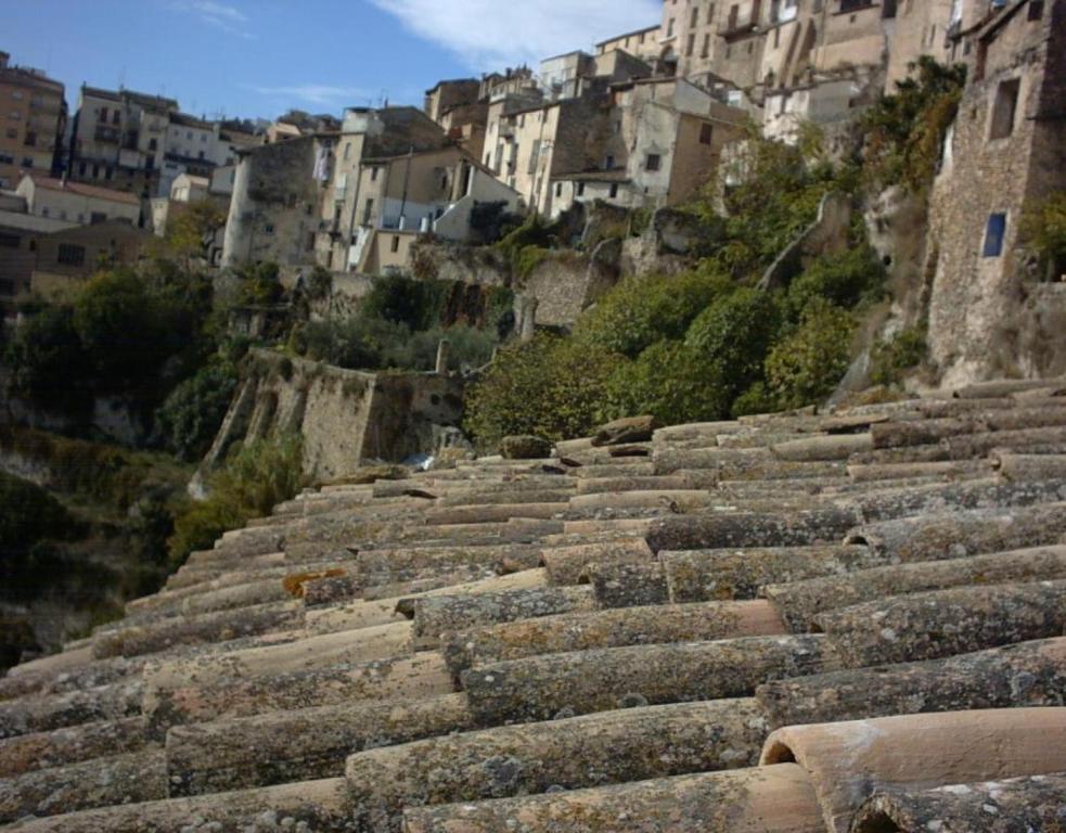 a set of stone stairs in front of buildings at Casa Gimeno in Bocairent