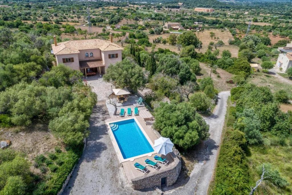 an aerial view of a house with a swimming pool at Sa Corbaia Nova in Artá