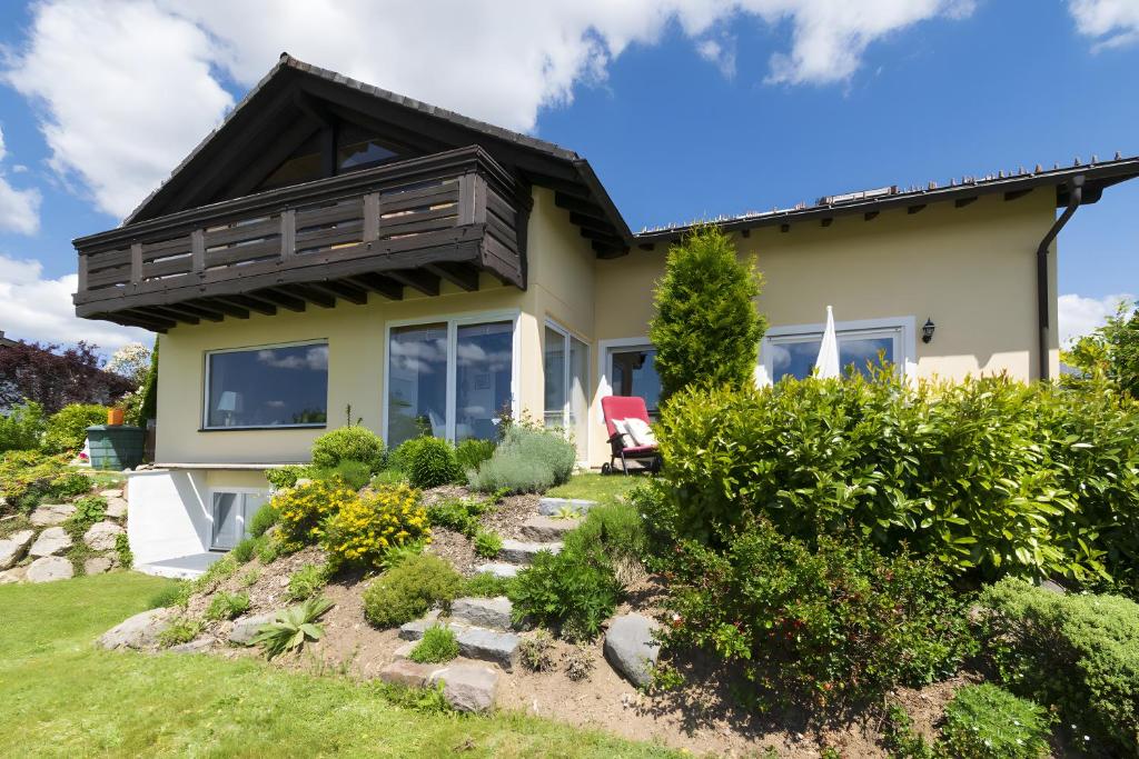 a house with a garden in front of it at Haus Höhensonne in Höchenschwand