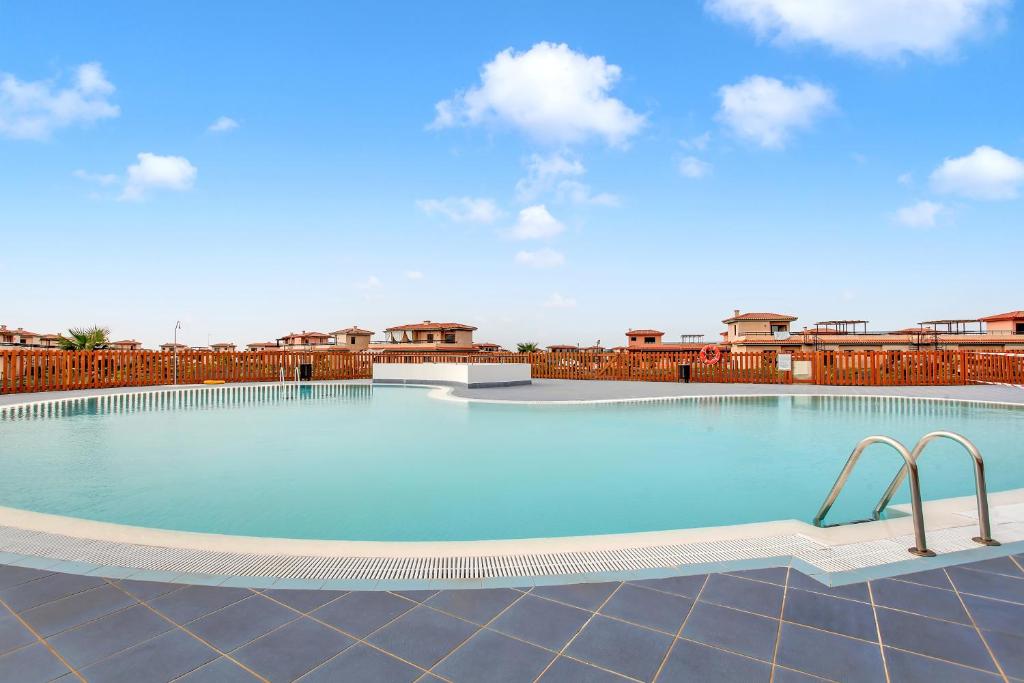 a large swimming pool on top of a building at Villa Asensio in Lajares