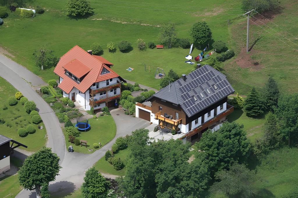 an overhead view of a large house with a yard at Ferien Auf Dem Steingrubenhof in Sankt Peter
