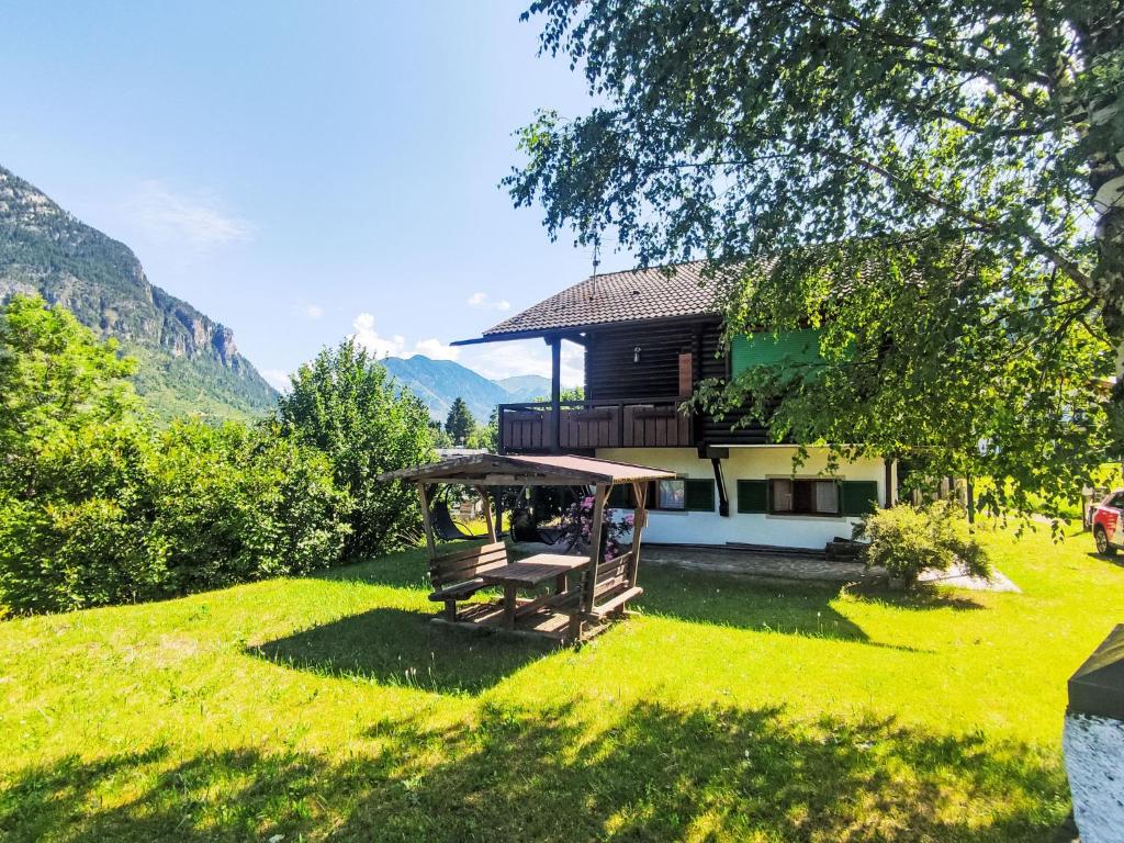 a house on a hill with a gazebo at Apartment Chalet Altavista by Interhome in Ziano di Fiemme