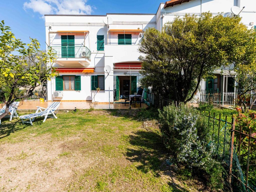 a house with a yard in front of it at Apartment Marisol by Interhome in Toirano